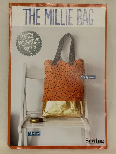 The Millie bag sewing pattern by Simply Sewing. The cover shows a two tone tote bag.