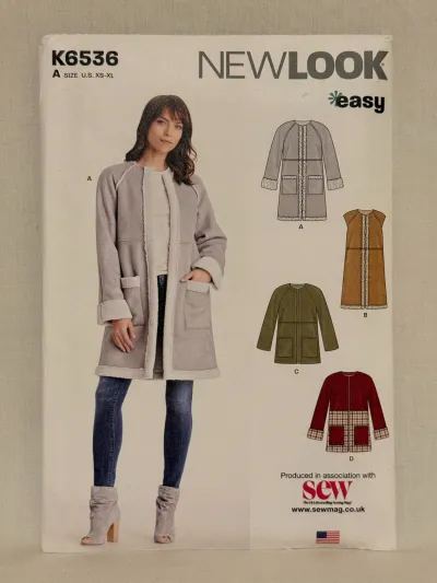 A New Look K6536 sewing pattern in sizes XS-XL. On one side of the cover is a woman wearing a winter jacket, on the other side are pictures of four jackets.
